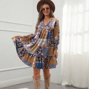 See You Monday Vibrant Blue Brown dress. Stock photo slightly different pattern